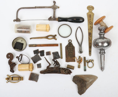 An assorted lot including turned steel plumb weight and cord with boxwood bobbin