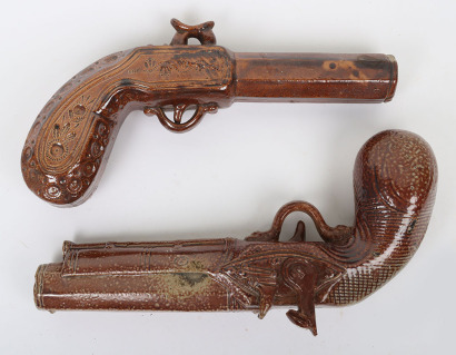 Lambeth ware salt glazed pottery flask in the form of a flintlock pistol