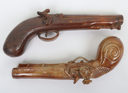 Lambeth ware salt glazed pottery flask in the form of a percussion pistol,