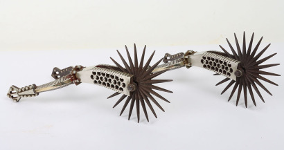 An elaborate pair of South American gaucho spurs for the charro