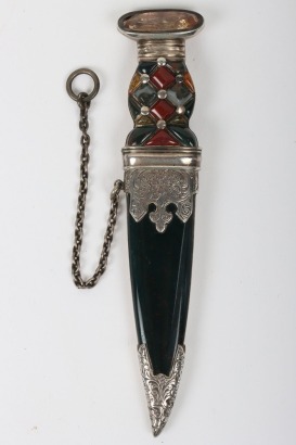 Scottish hardstone and silver brooch in the form of a skian dhub