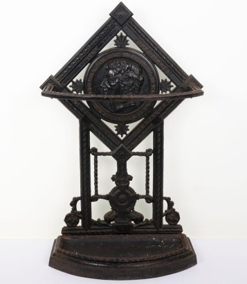 Black painted cast iron umbrella stand incorporating a roundel cast with bust of Nelson