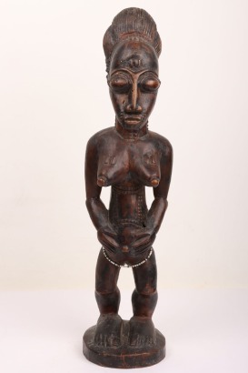 Carved wooden female standing figure, probably Ivory Coast