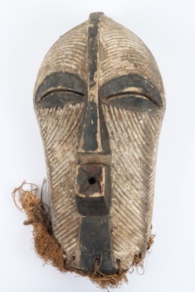 Songye Kifwebe carved and white decorated wooden mask from the Democratic Republic of the Congo