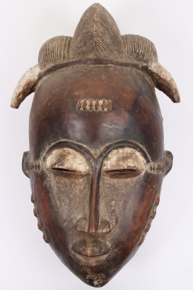 Baule carved and painted wooden mask from the Ivory Coast