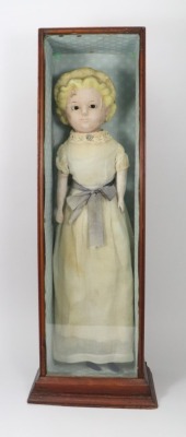 A cased &lsquo;Pumpkin head&rsquo; wax over composition shoulder head doll, German 1860s,