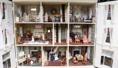 A large and impressive painted grey wooden dolls house and contents, English 1905, - 2