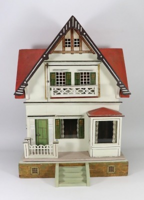 A painted wooden Chalet style Dolls House by Albin Schoenherr, German circa 1915,