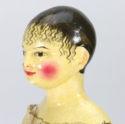 A rare and exquisite early painted carved wooden doll with her original extensive wardrobe, including seven gowns, nightdress and initialled undergarments, German circa 1810, - 7