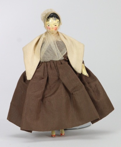 A good painted wooden Grodnertal doll in original Quaker style clothes, German circa 1820,