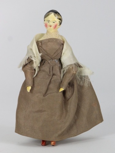 A good painted wooden Grodnertal doll in original Quaker style clothes, German circa 1820,
