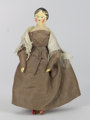 A good painted wooden Grodnertal doll in original Quaker style clothes, German circa 1820,