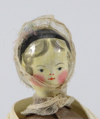 A good painted wooden Grodnertal doll in original Quaker style clothes, German circa 1820, - 2