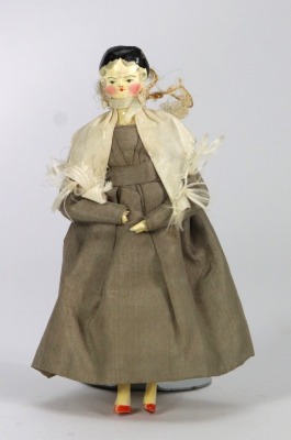 A good painted wooden Grodnertal doll in original Quaker style clothes, German circa 1820,