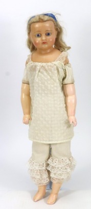 A wax over composition shoulder head doll, German circa 1860,