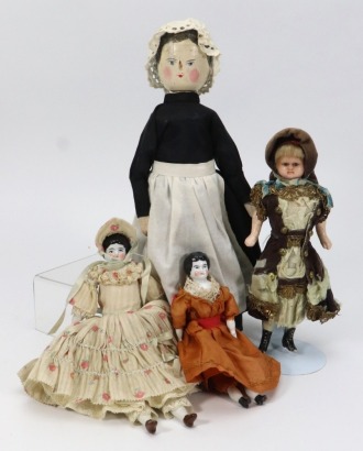 A miniature early German wax over composition shoulder head doll in original clothes, circa 1860,