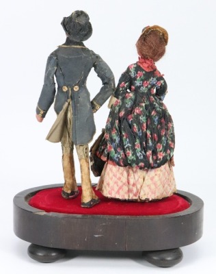 A pair of Edwardian composition shoulder head dolls in original crepe outfits, - 2