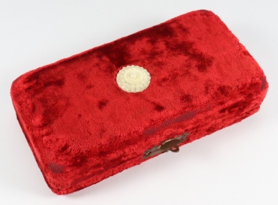 A good collection of miniature fashion doll accessories in a red velvet box, circa 1860, - 2