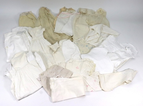 A selection of various dolls clothes,