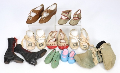 *A collection of nine pairs of dolls shoes,