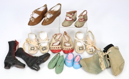 *A collection of nine pairs of dolls shoes,