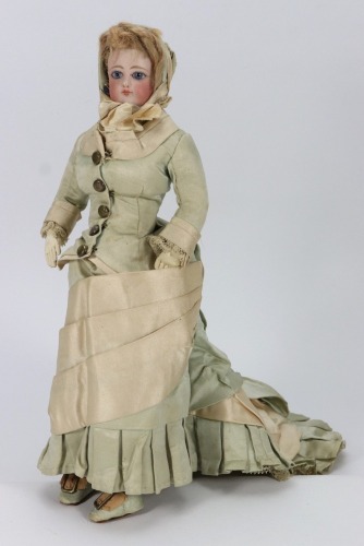 A Francois Gaultier bisque shoulder head fashion doll in original clothes, French circa 1870,