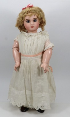 A rare early Premiere Bebe Jumeau bisque head doll in original box, size 12, French circa 1880,