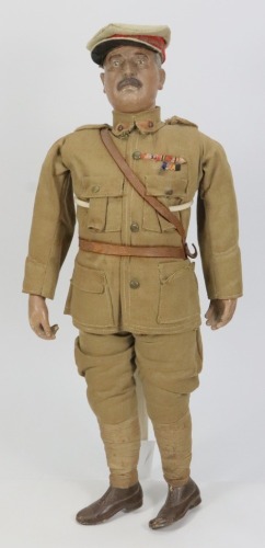 A rare Lord Kitchener propaganda composition doll, circa 1915,