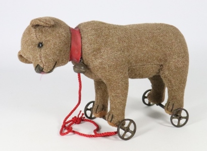 A good early Steiff bear on wheels, German circa 1905,