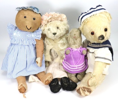 Three Teddy bears and a toy Rabbit,