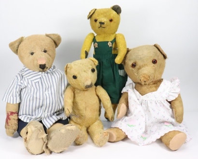 Four various English Teddy bears,