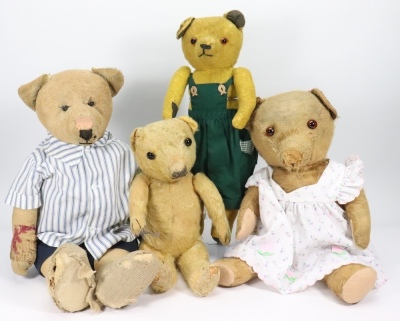Four various English Teddy bears,