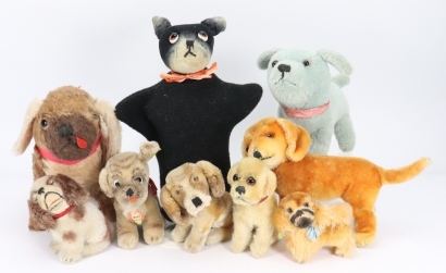 A collection of nine toy dogs,