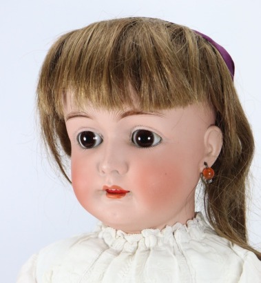 A Simon & Halbig/W.S.K bisque head girl doll, German circa 1910,
