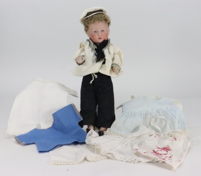A small Kammer & Reinhardt 101 &lsquo;Peter&rsquo; bisque head character doll, German circa 1909,