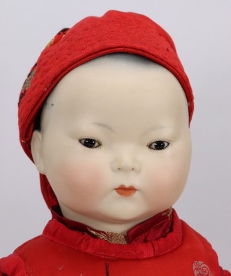 *A large all original bisque head Asian baby, German circa 1910, - 2
