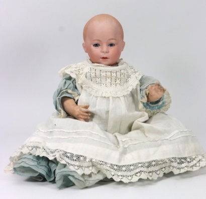 A Swaine & Co D.V bisque head character baby doll, German circa 1910,