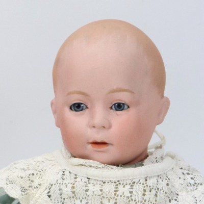 A Swaine & Co D.V bisque head character baby doll, German circa 1910, - 2