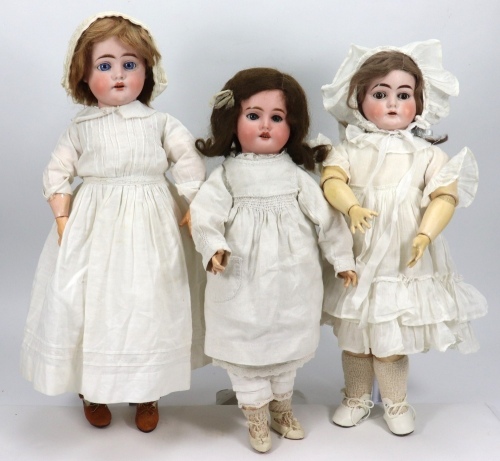 Three bisque head girl dolls including a DEP 1900, circa 1915,