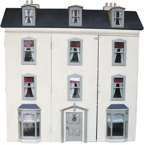 A large and impressive painted grey wooden dolls house and contents, English 1905,