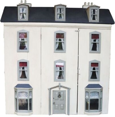 A large and impressive painted grey wooden dolls house and contents, English 1905,