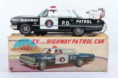 Okuma (Japan) Tinplate Battery Operated T.V. control Chevrolet Highway Patrol Car