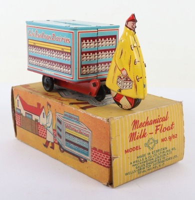 A Welsotoys Tinplate Clockwork Mechnical Milk Float - 3
