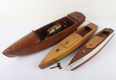 Three wooden hulled Motor boats