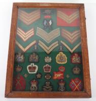 Framed Display of British Cloth Rank and Proficiency Badges