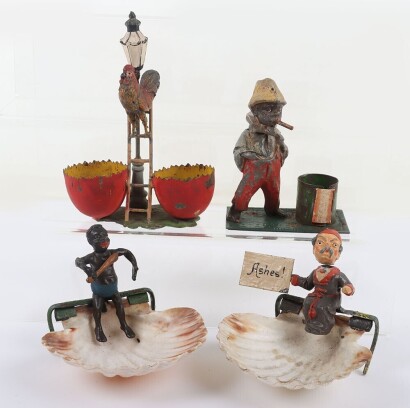 Three lead painted Nodding figures with ashtrays