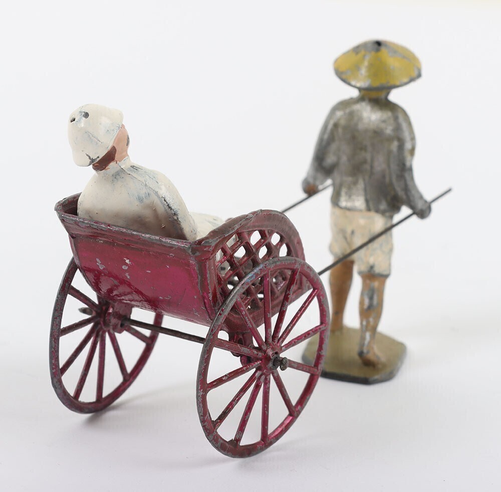French lead painted Rickshaw with seated Colonial passenger
