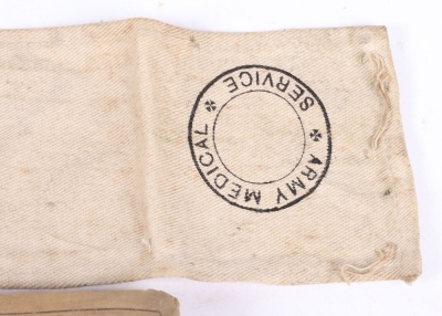 A WW1 First Field Dressing and RAMC Red Cross Armband. - 3