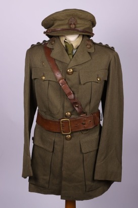 WW1 Uniform and Peaked Cap of Captain Alfred Johnson Leeming Royal Fusiliers, Killed in Action by a Sniper on the 1st Day of the Third Battle of Ypres on 31st July 1917, the set consists of a four pocket 1917 pattern shoulder rank tunic with bronze OSD re