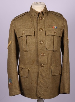 4th Territorial Battalion Royal Welsh Fusiliers &acirc;&euro;&tilde;Old Contemptibles&acirc;&euro;&trade; 02 Pattern Tunic, fine and atmospheric other ranks 1902 pattern service dress tunic in khaki wool. The tunic is complete with brass general service buttons, pioneer rifle and pickaxe 